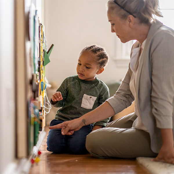 adult and child in school
