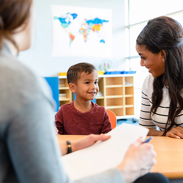 adult and child in school