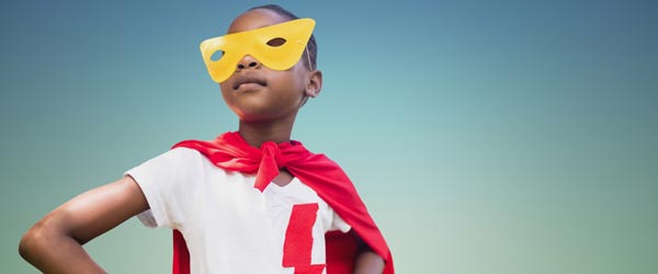 little boy dressed as superhero